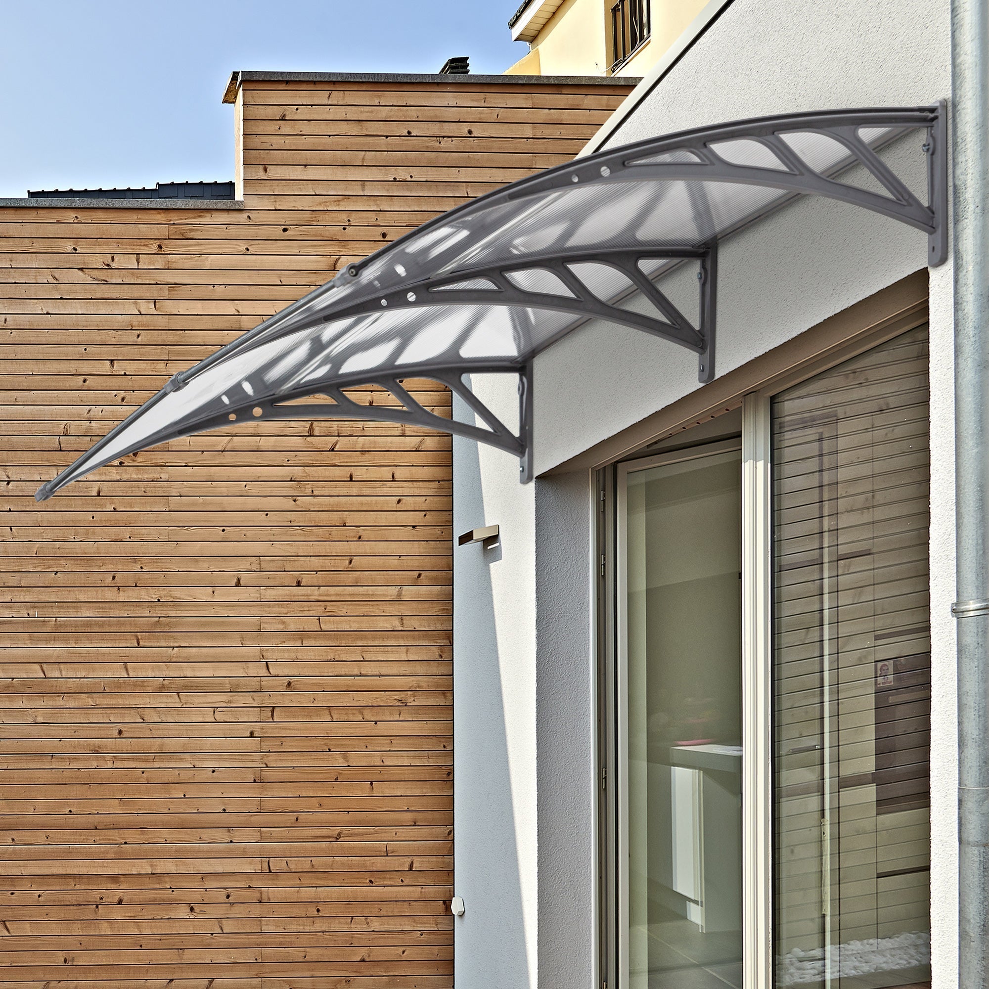 Outsunny gray metal door canopy awning with translucent arched canopy and geometric lattice for porch light snow protection