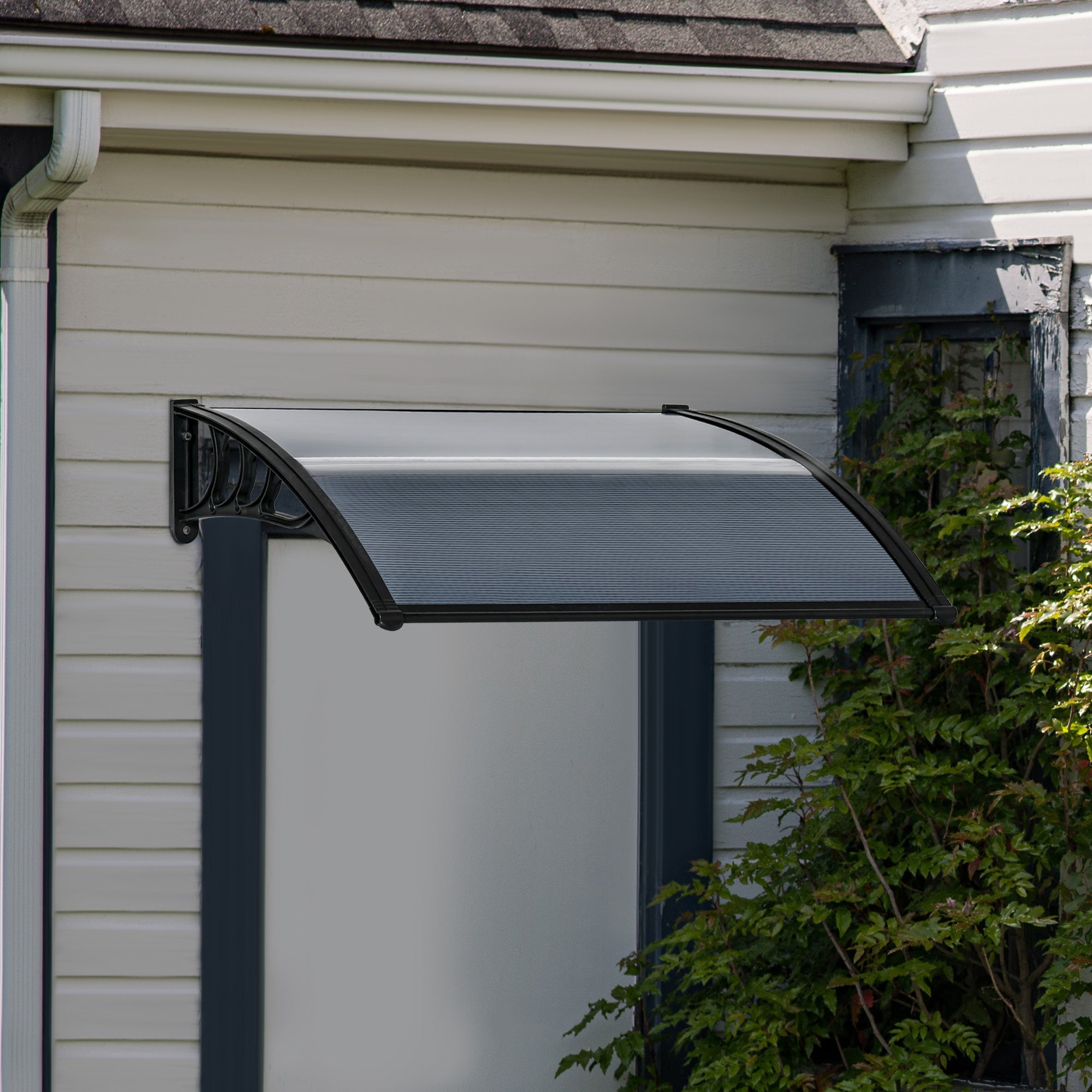 Outsunny black metal awning with translucent ribbed plastic roof panel ideal for door rain shelter and light snow protection