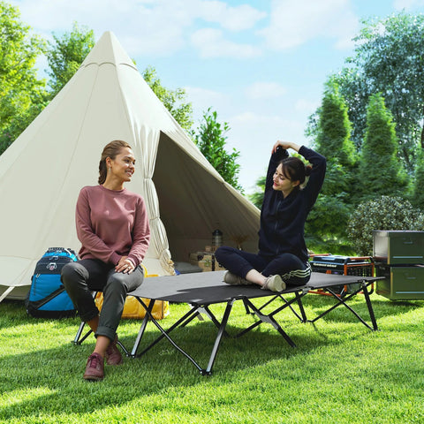 Black foldable double camping cot bed with metal frame and oxford fabric in charcoal grey for two people