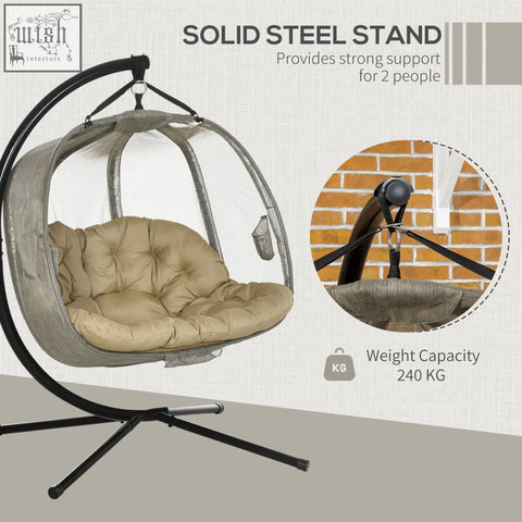 Black steel hanging egg chair with beige cushion and transparent mesh enclosure perfect for indoor outdoor use