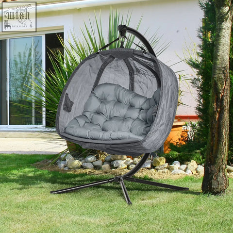 Outsunny grey hanging egg chair with cushioned seat basket and black metal stand for indoor outdoor use