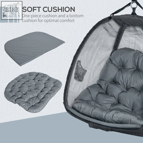 Gray tufted cushion on the seat basket of outsunny hanging egg chair with mesh enclosure for indoor outdoor use