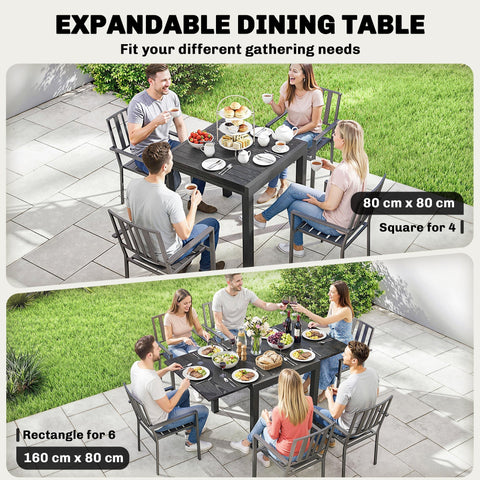 Black extendable garden table with matching chairs featuring sleek aluminium frame and faux wood slatted top for outdoors