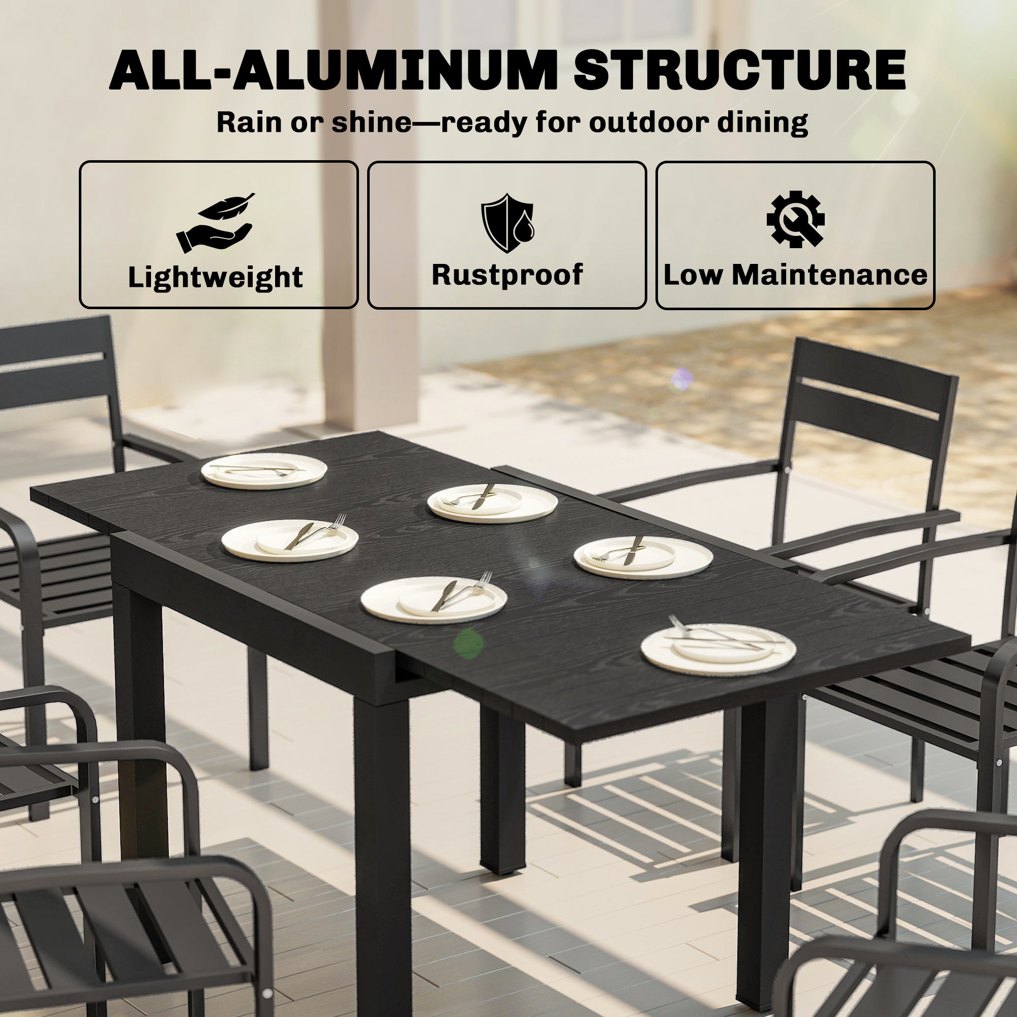 Black all-aluminum extendable garden table with faux wood slatted top and matching chairs for outdoor use