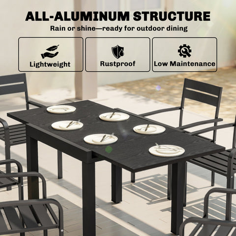 Black all-aluminum extendable garden table with faux wood slatted top and matching chairs for outdoor use