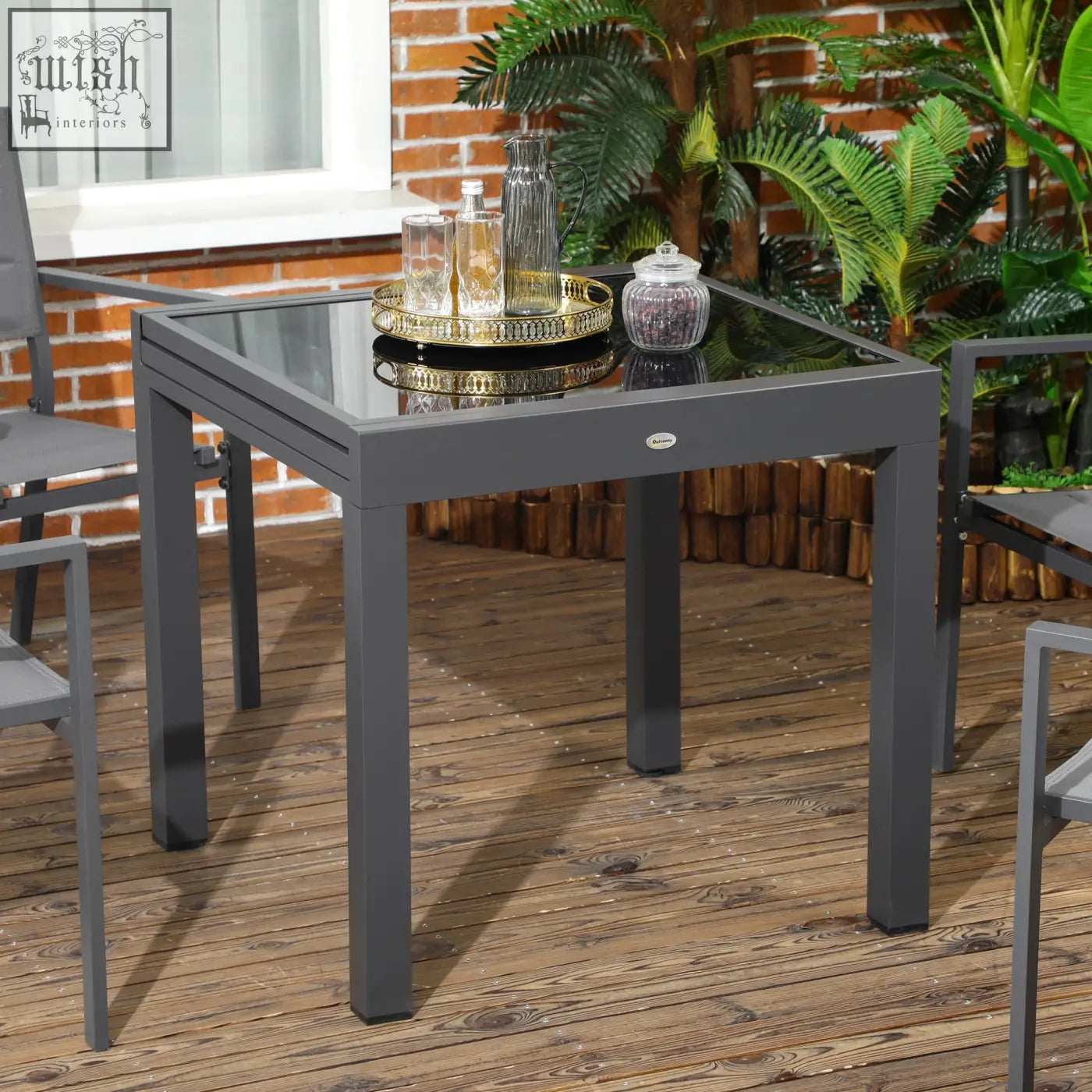 Gray metal outdoor dining table with tempered glass top and black aluminium frame by outsunny