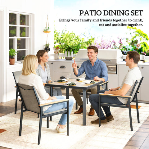 Outsunny five-piece patio dining set with black metal frame, gray mesh seats, light wood armrests, and wood-effect tempered glass table top