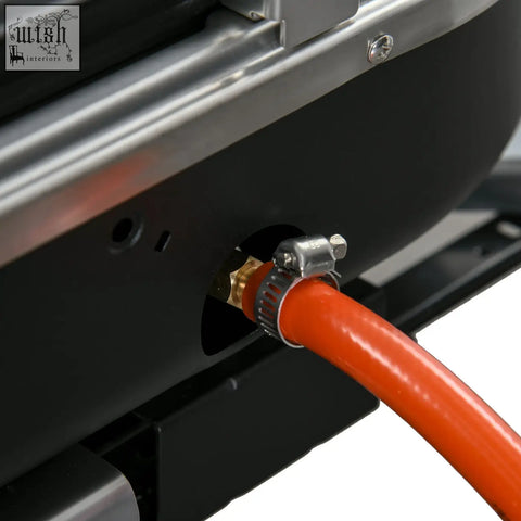 Bright orange flexible hose with brass fitting connected to two gas bbq outsunny foldable grill with piezo ignition