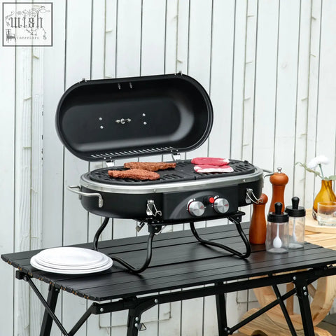 Black oval portable gas bbq grill with two gas burners piezo ignition aluminium alloy frame cooking meat with lid open