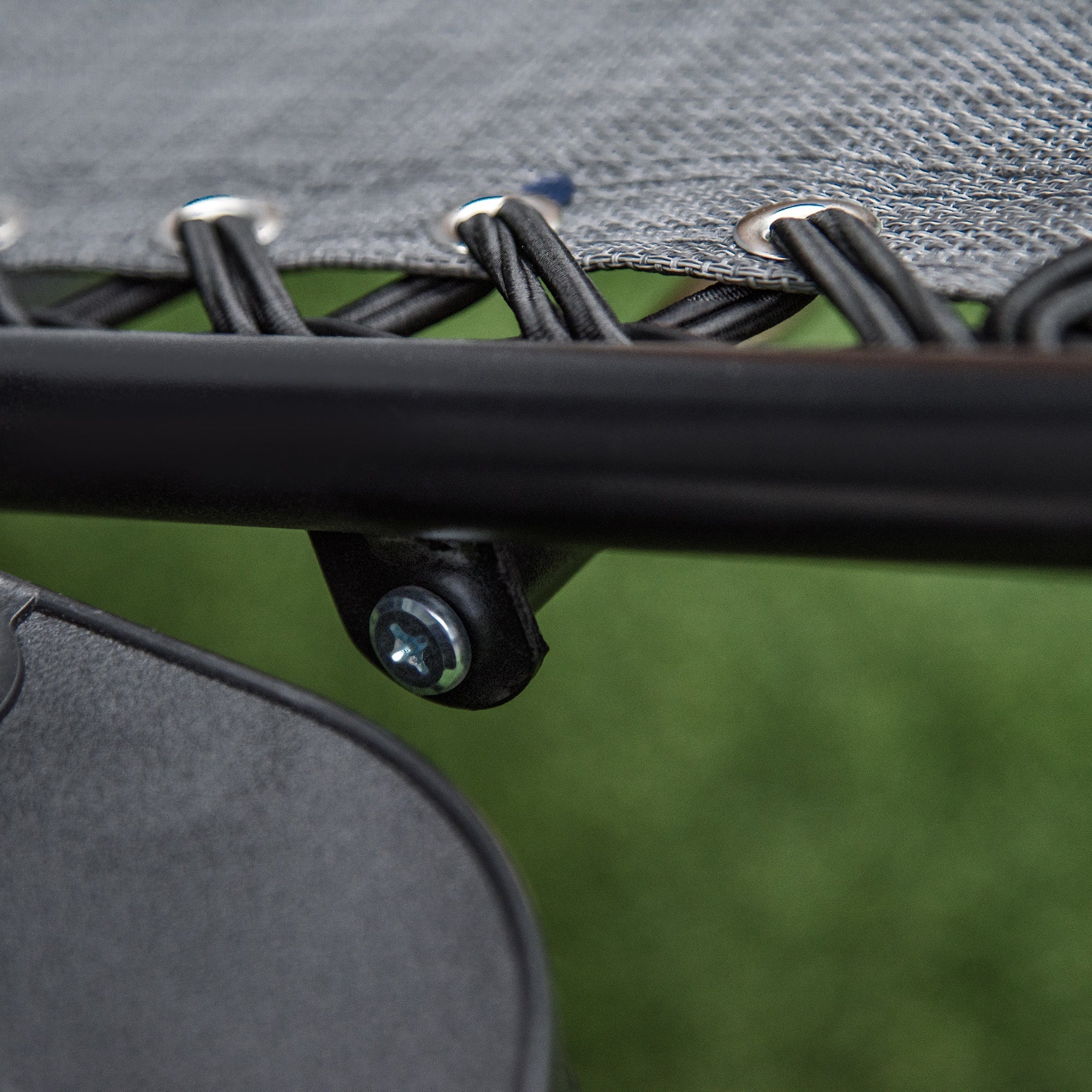 Black metal bracket with silver screw securing the frame of an outsunny light grey reclining garden chair