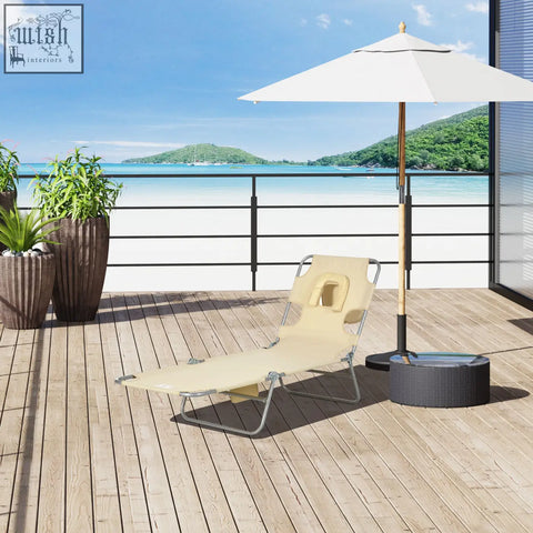 Beige foldable sun lounger with powder coated steel frame and headrest support for patio garden and beach use