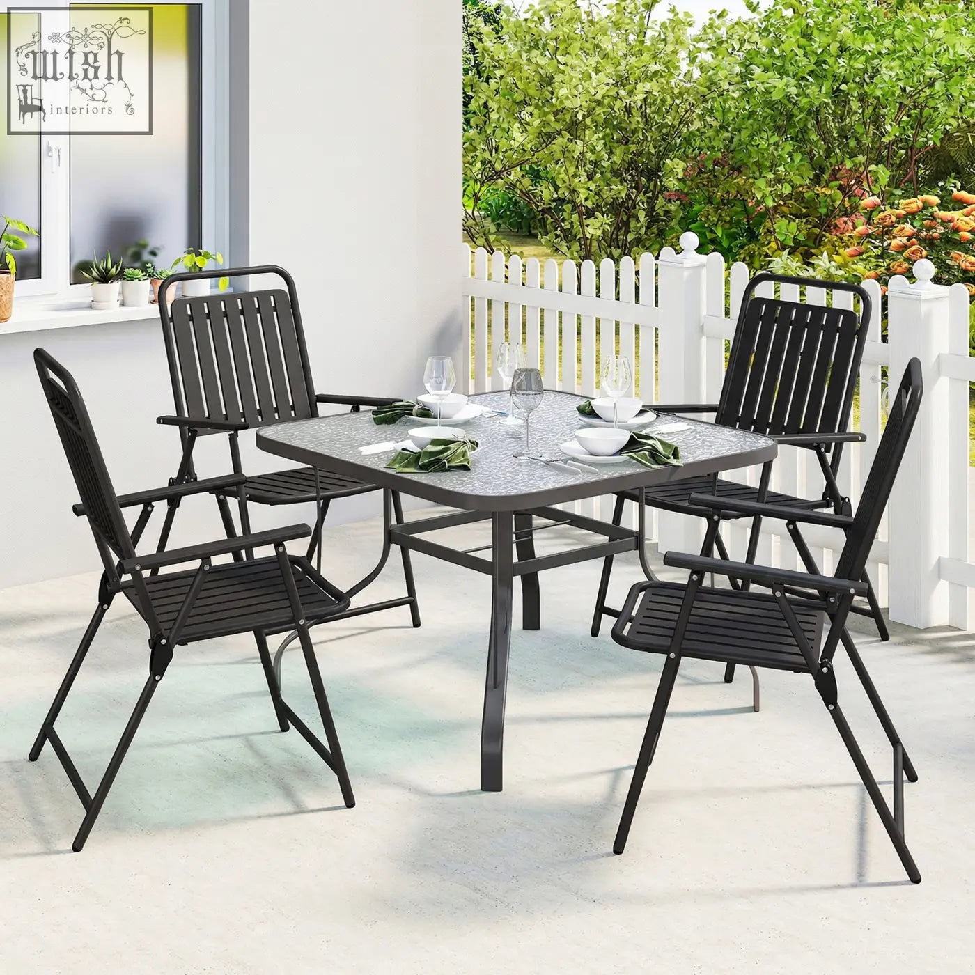 Black metal outsunny folding garden table with textured gray top and matching folding garden chairs in steel frame