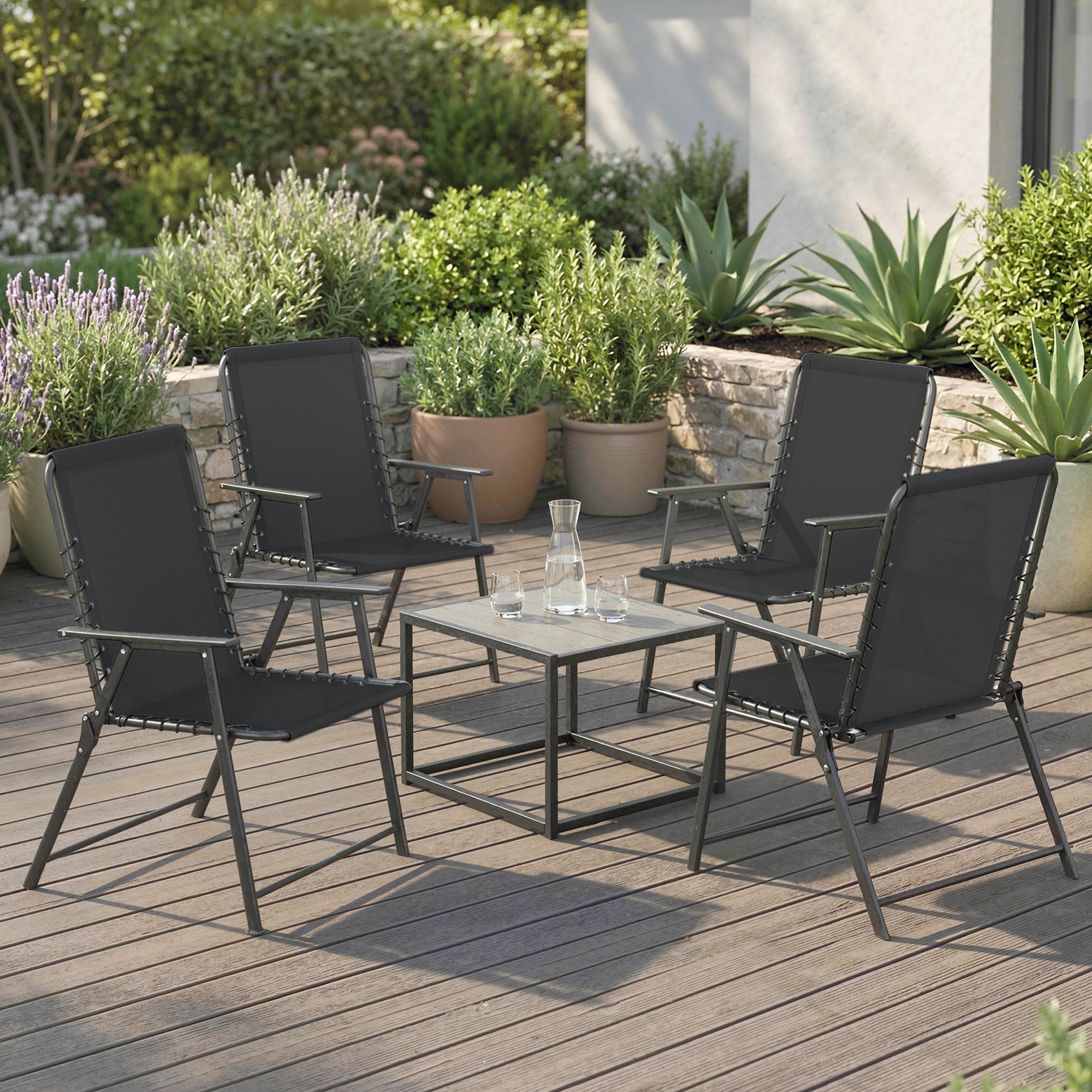 Black outsunny folding garden chairs set of 4 with elastic bungee ropes around a matching table on wooden deck