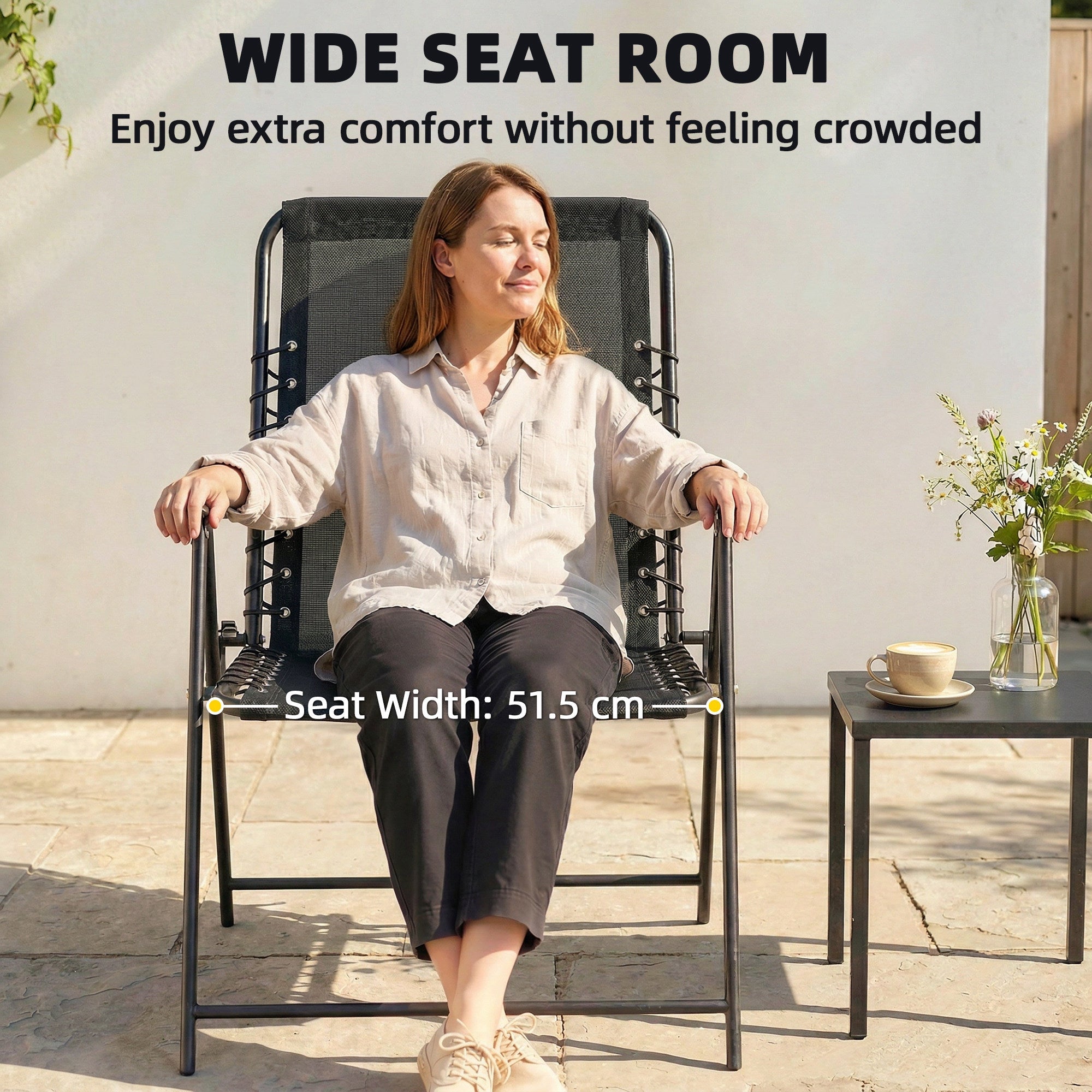 Black mesh reclining garden chair with wide texteline seat metal frame and elastic bungee ropes for outdoor use