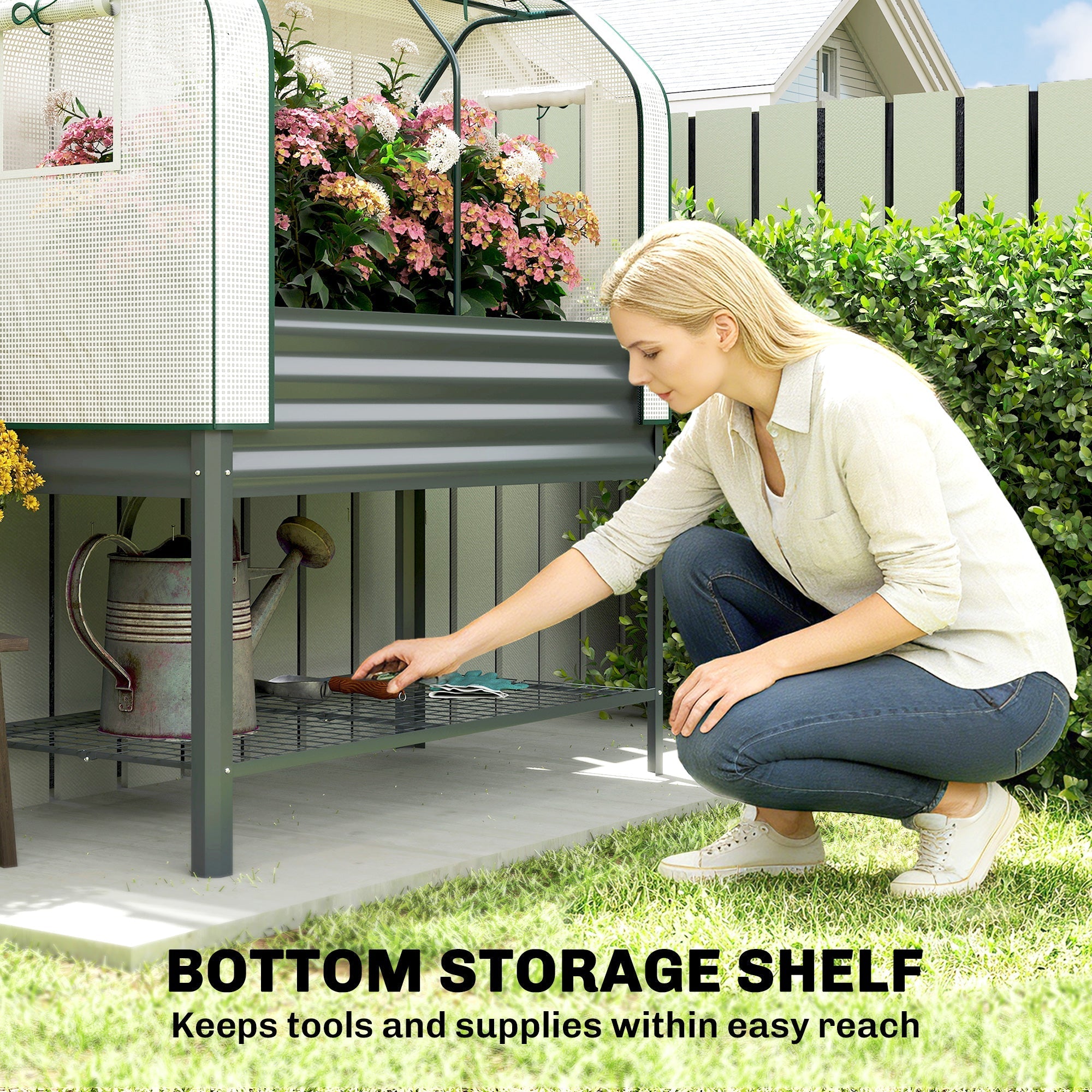 Gray metal raised planter with mesh sides and greenhouse cover on legs with bottom shelf for raised garden use