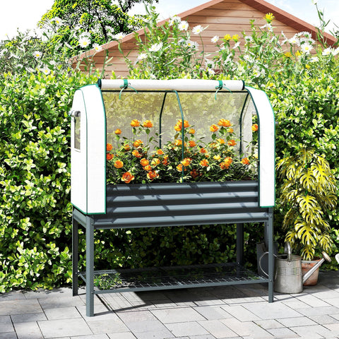 Gray metal raised planter with greenhouse cover and green trim featuring a lower wire shelf for raised garden storage