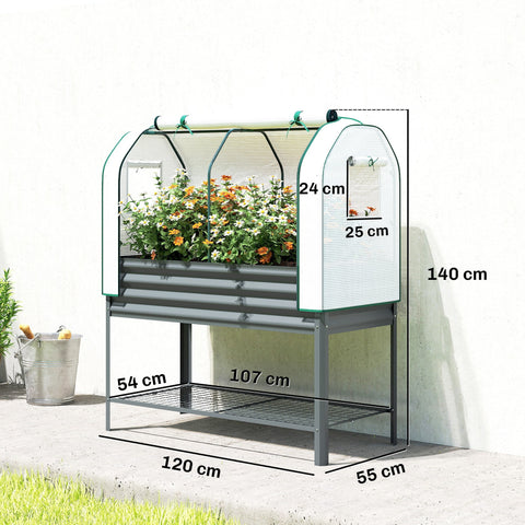 Gray metal raised planter with greenhouse cover in white mesh green trim filled with orange and white flowers