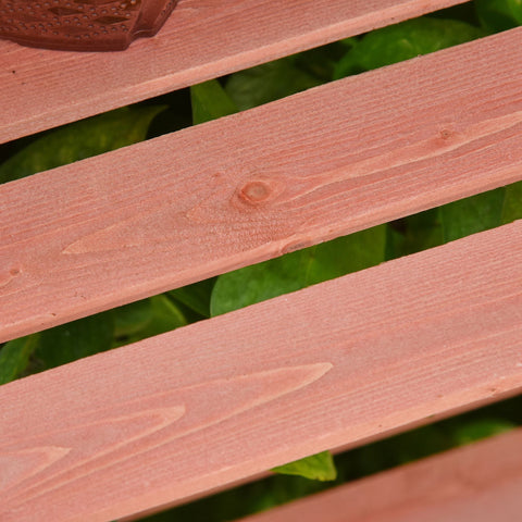 Pinkish-brown wood frame cold frame with visible grain and natural knot featuring adjustable shelves and double doors