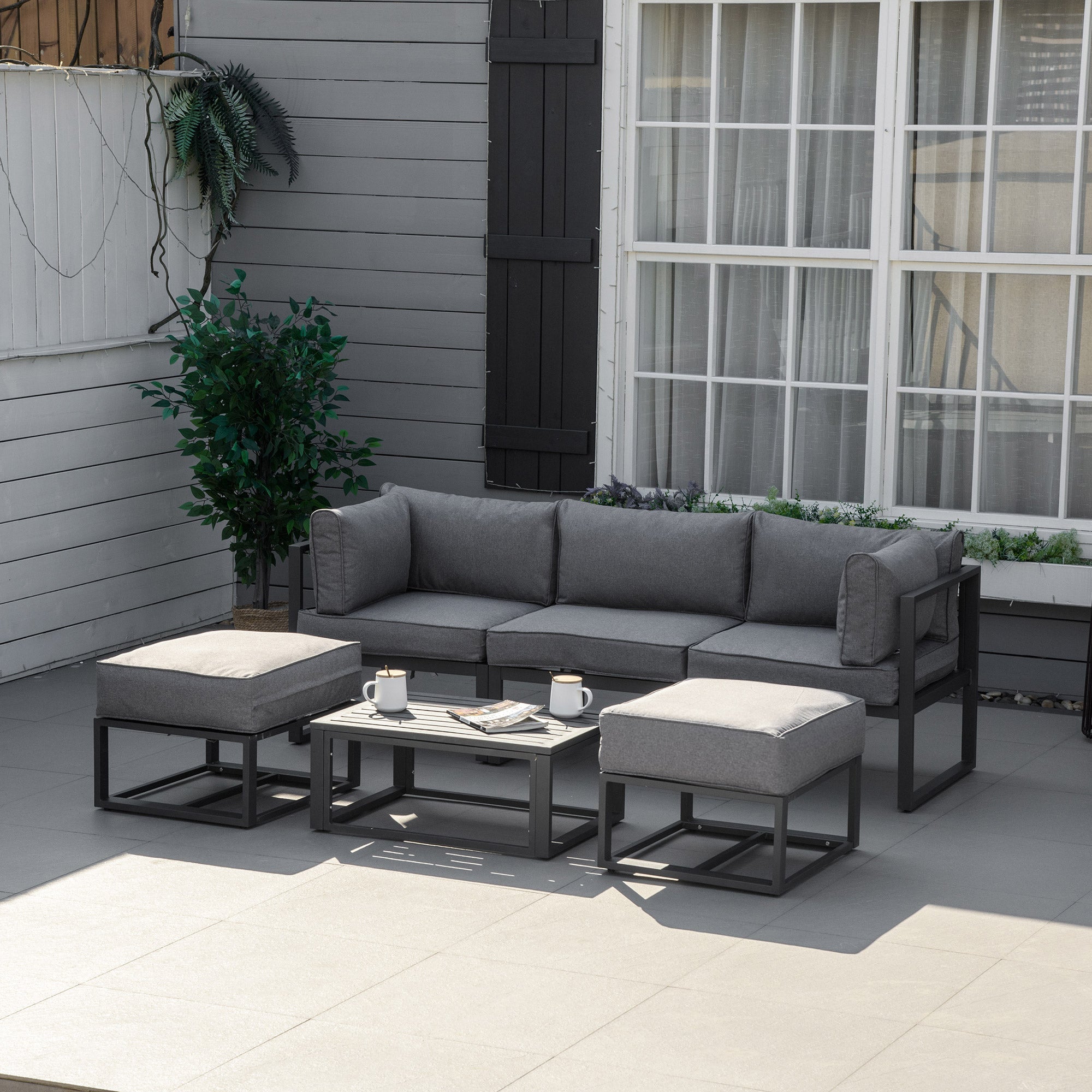 Modern gray outsunny garden daybed sofa set with aluminum frame, matching ottomans, and coffee table 65w x 63h