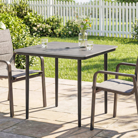 Gray outsunny garden dining table with faux wood top metal legs and umbrella hole for outdoor use