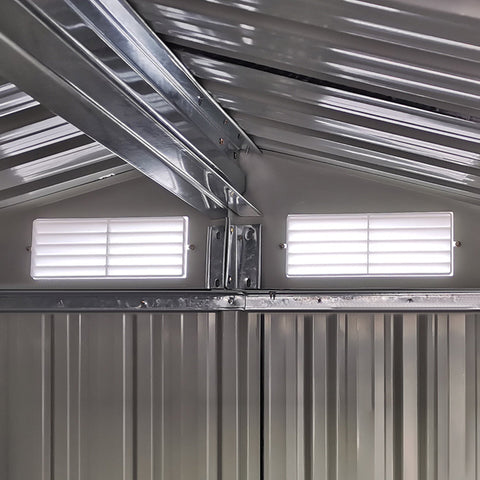 Silver corrugated metal roof with two louvered vents on grey outsunny garden metal tool storage shed with sliding door and foundation kit