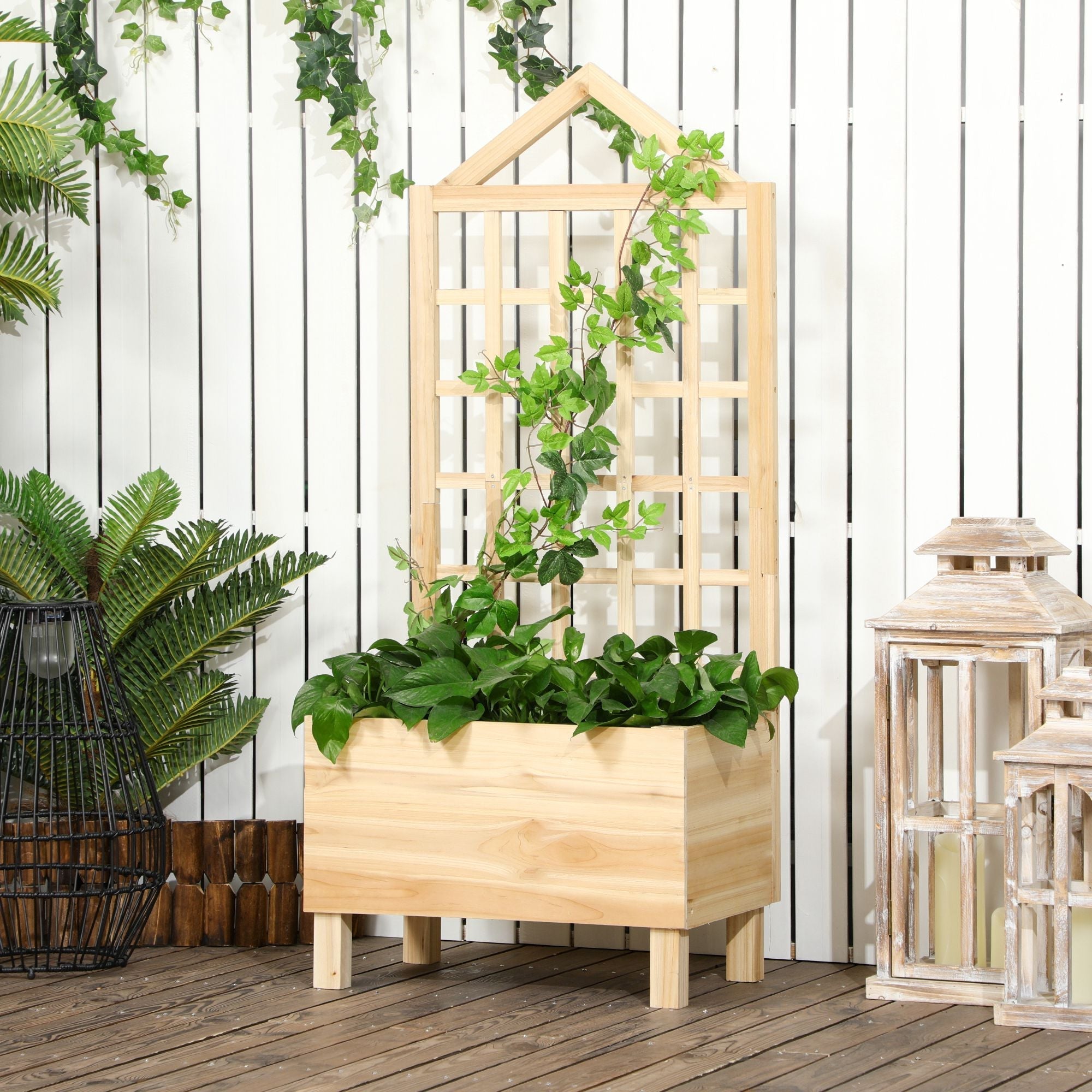 Light wooden outsunny garden bed with matching trellis supporting green vines natural tone no paint coating visible