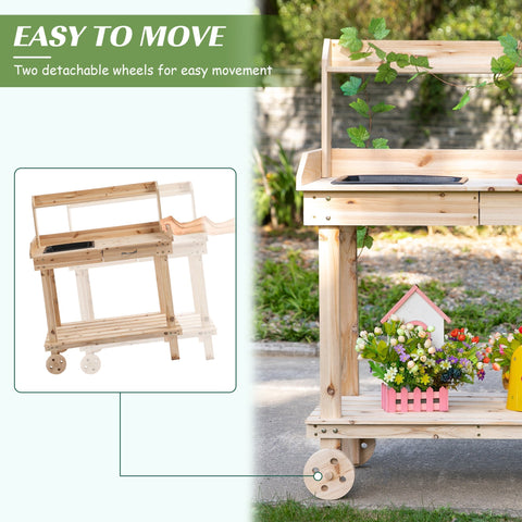 Light wooden garden potting bench with detachable wheels and lower shelf holding decorative planters for outdoor use