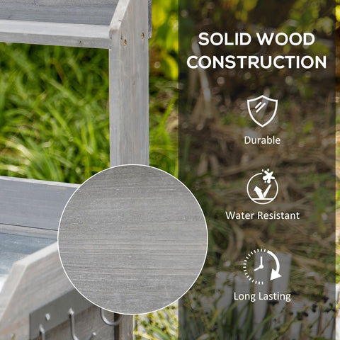 Gray wood garden potting table with solid construction and water-resistant finish for patios and balconies