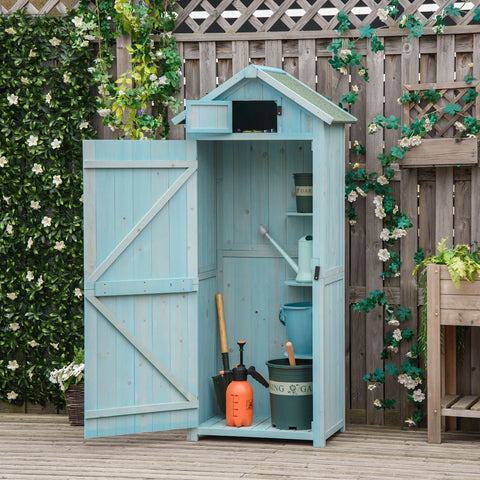 Light blue painted wooden outsunny storage shed with gabled roof and open door showing garden tools and small items inside