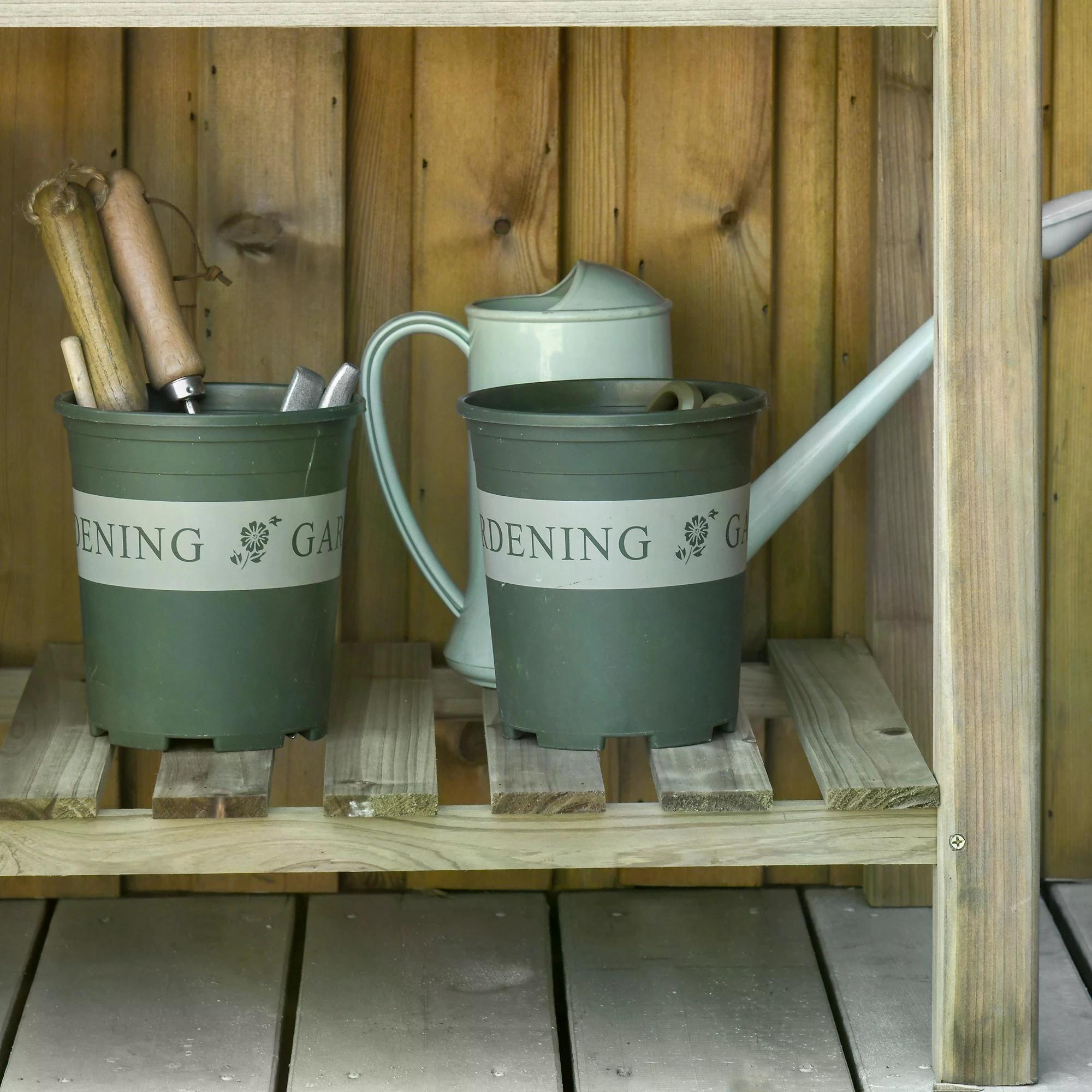 Olive green metal watering can with light gray handle and spout sits on fir wood outsunny garden wooden planter with storage shelf