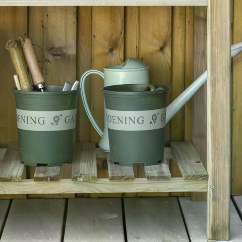 Olive green metal watering can with light gray handle and spout sits on fir wood outsunny garden wooden planter with storage shelf