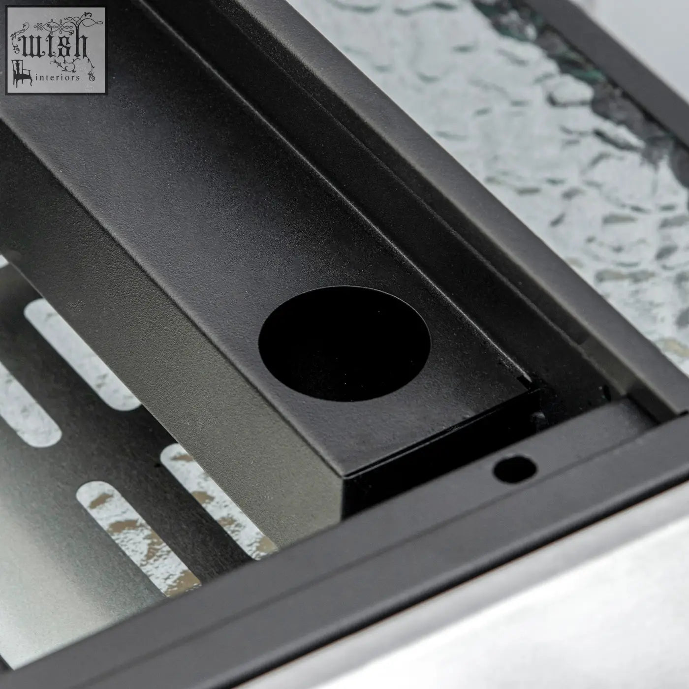 Black metal drain grate with circular opening and slotted design for grease collection box on outsunny gas plancha grill