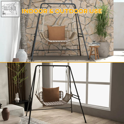 Black metal frame swing with woven wicker seat and brown cushion on powder coated metal frame stand for porch use