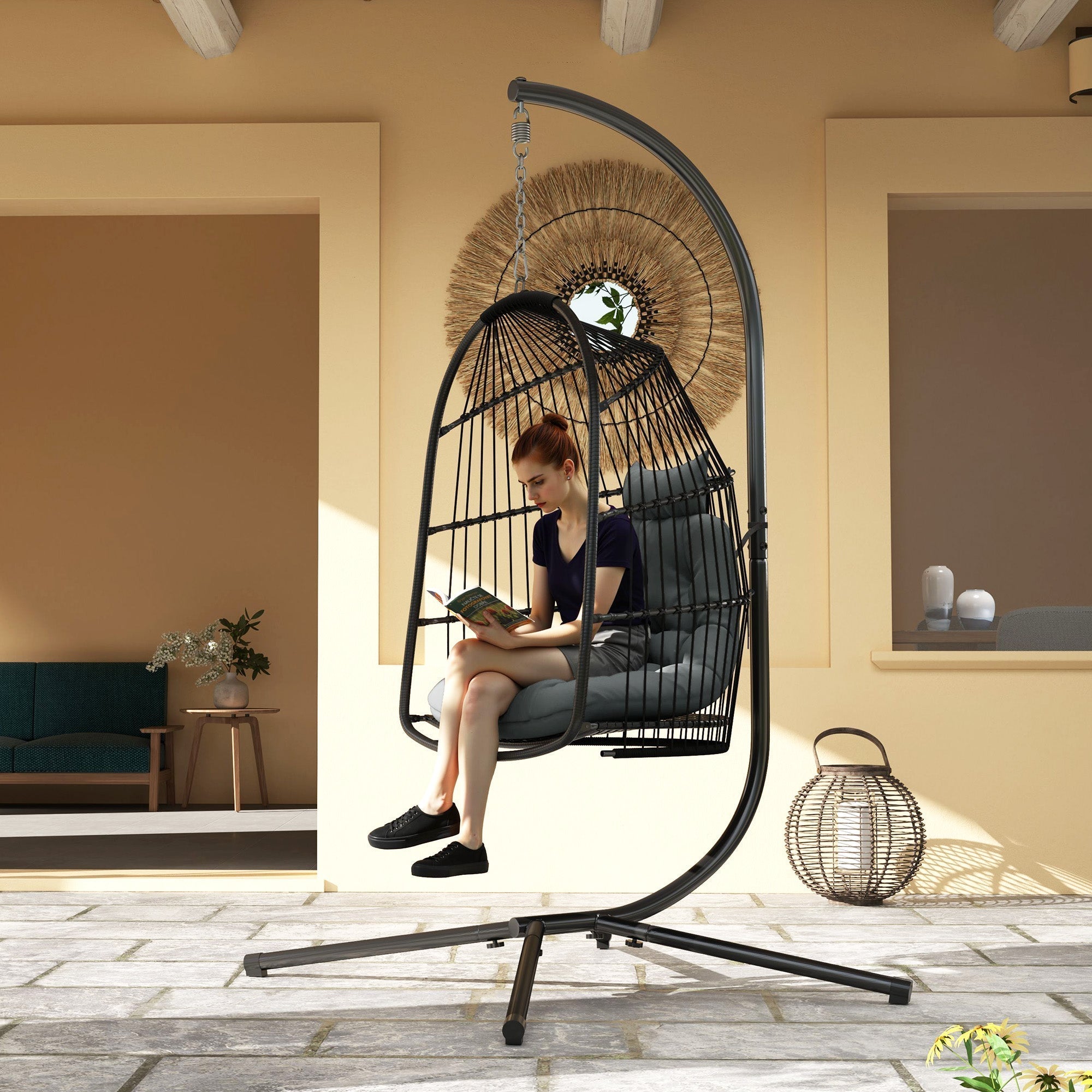 Black metal steel frame swing chair with gray cushioned seat and backrest by outsunny for indoor outdoor use