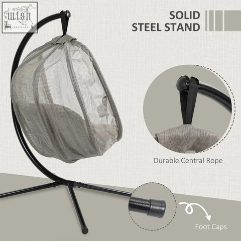 Gray mesh hanging egg chair with black steel stand by Outsunny for indoor outdoor patio and garden use