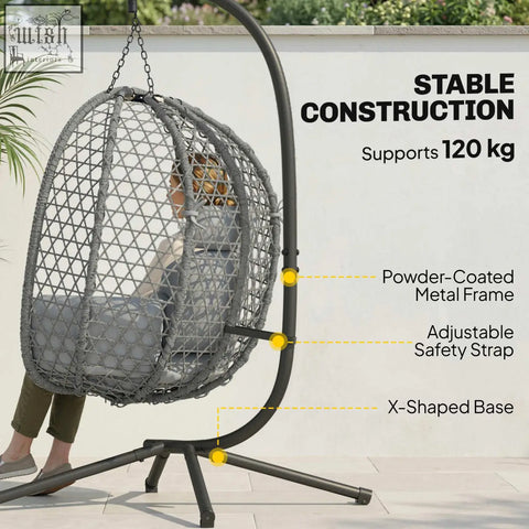 Gray woven wicker hanging egg chair with powder-coated metal frame and adjustable safety strap for indoor outdoor use