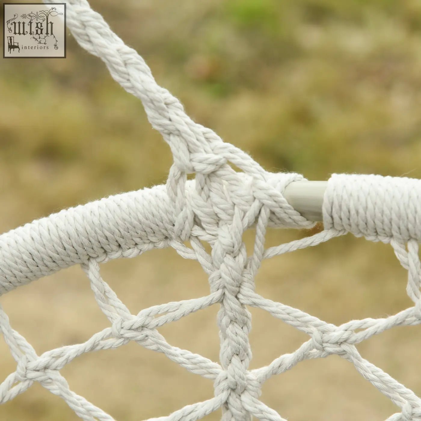 Cream white cotton rope hammock chair with sturdy braided netting and metal frame for indoor or outdoor hanging hammock chair