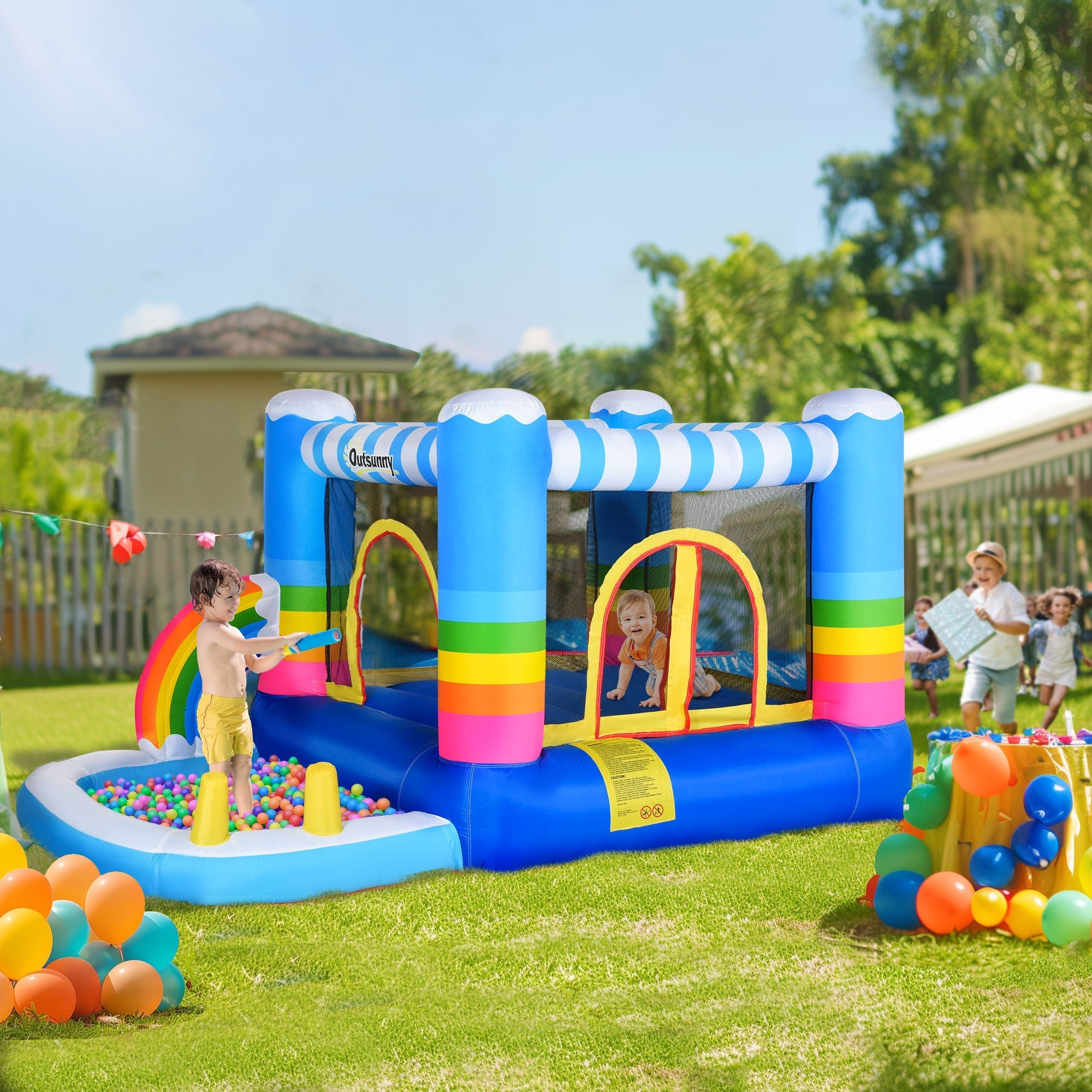 A vibrant blue Outsunny kids bounce castle with rainbow columns two doors easy access and ground stakes included