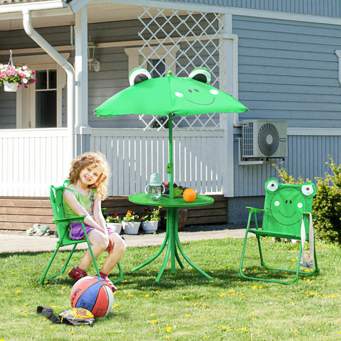 Green frog-themed patio umbrella with smiling face and googly eyes on outsunny kids outdoor chair with sun umbrella