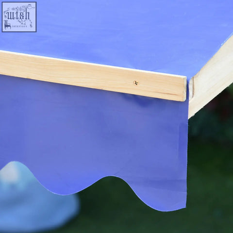 Blue fabric awning with light wood frame on fir wood wooden sand pit for outdoor kids play station sandbox