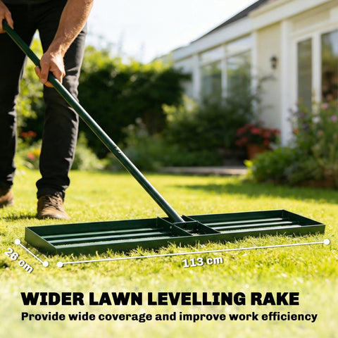 Green metal lawn levelling rake with long handle and wide flat head for efficient lawn levelling and grass smoothing