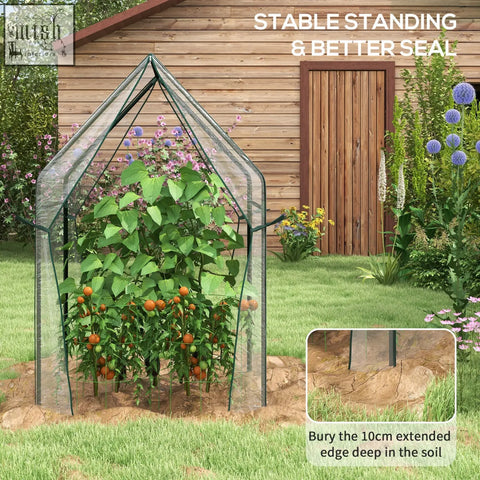 Green-framed outsunny mini greenhouse with clear plastic cover, zipped doors, and tomato plants inside, portable with long edges