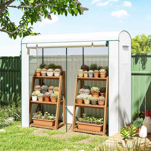 White outsunny mini greenhouse with steel frame, mesh windows, wooden shelves, and roll-up door to keep unwanted guests out