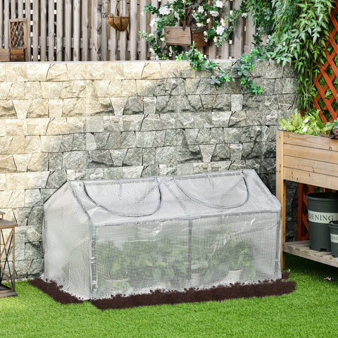 Outsunny mini greenhouse with silver plastic cover, reinforced frame, handles, and zipper for garden use, 120 x 60 x 60 cm