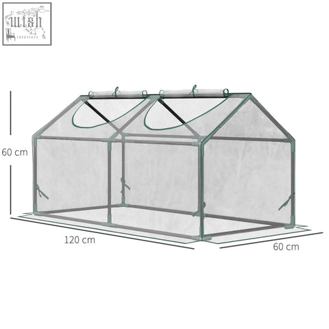 Clear plastic mini greenhouse with green metal frame and plastic cover measuring 120 by 60 cm with zipped windows