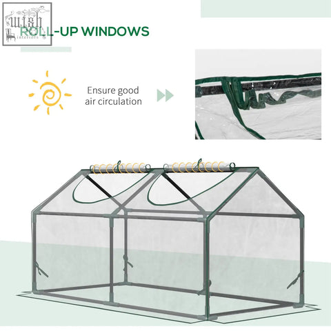 Green-framed outsunny mini greenhouse with clear plastic cover and transparent roll-up zipped windows for good air circulation