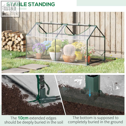 Green metal-framed mini greenhouse with plastic cover and zipped windows housing cacti and flowering plants