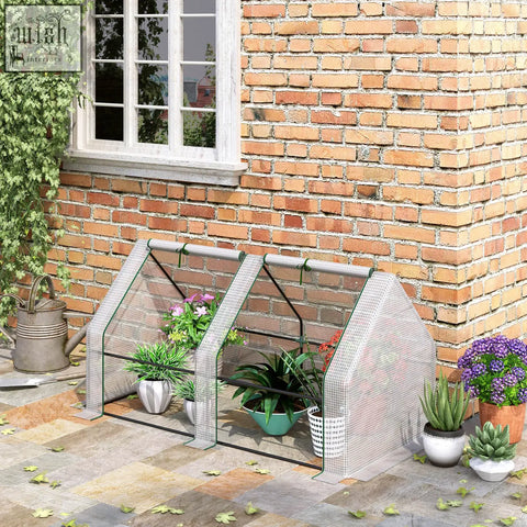 Outsunny mini greenhouse with black steel frame green trim and transparent plastic mesh cover for plants and vegetables