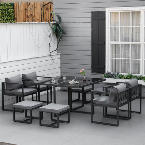 Modern black metal patio set with gray cushioned seating and 45w x 45d cushion dimension with tempered glass table