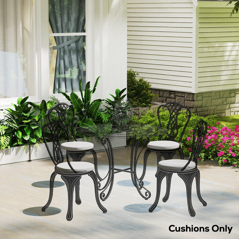 Black wrought iron patio dining set with light grey outdoorsy seat cushions from outsunny with removable covers